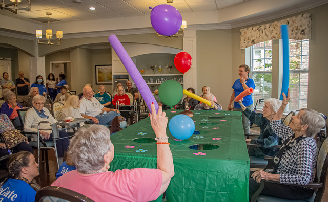 Bethesda Hawthorne Place residents playing Whack-A-Mole