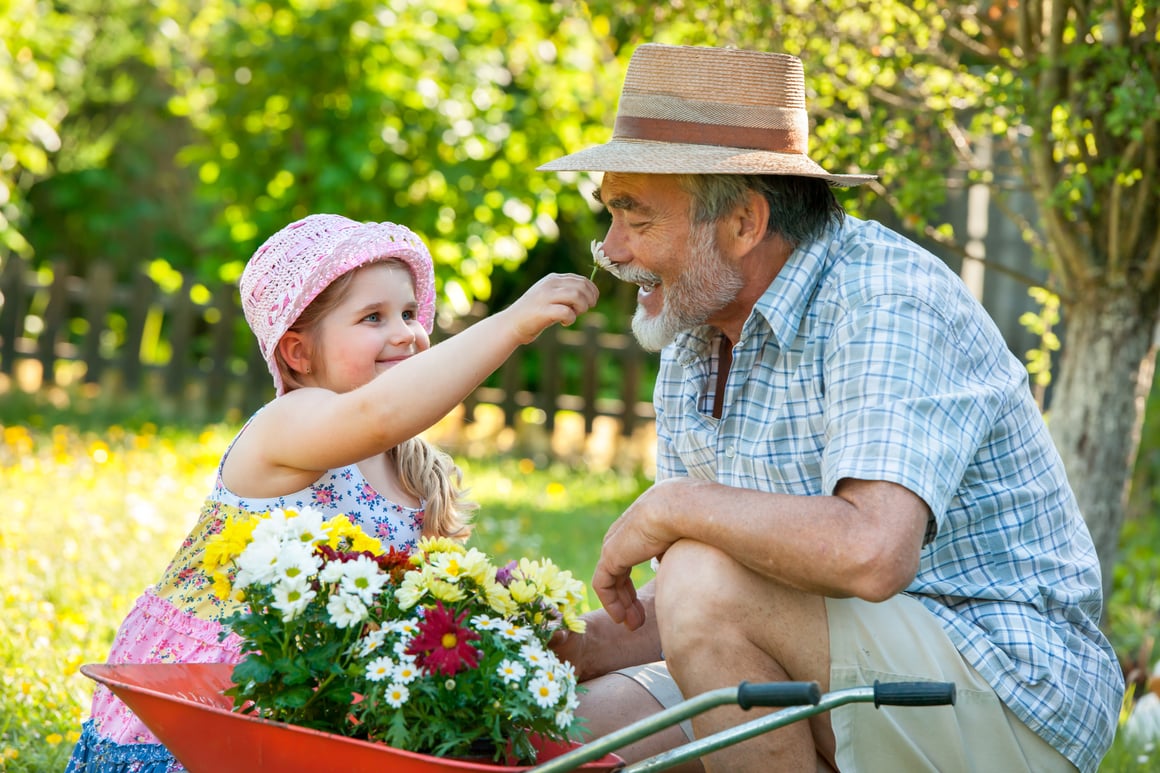 Man Gardening with Grandchild