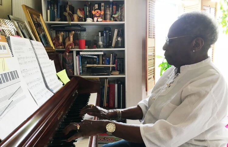 Willard Harris playing piano