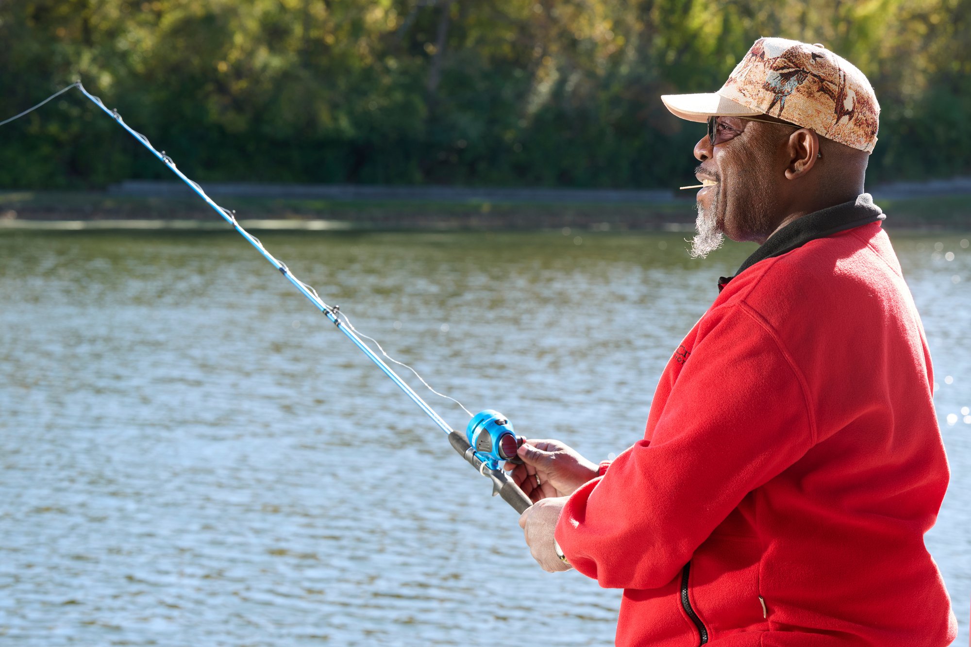 Village North resident fishing in lake