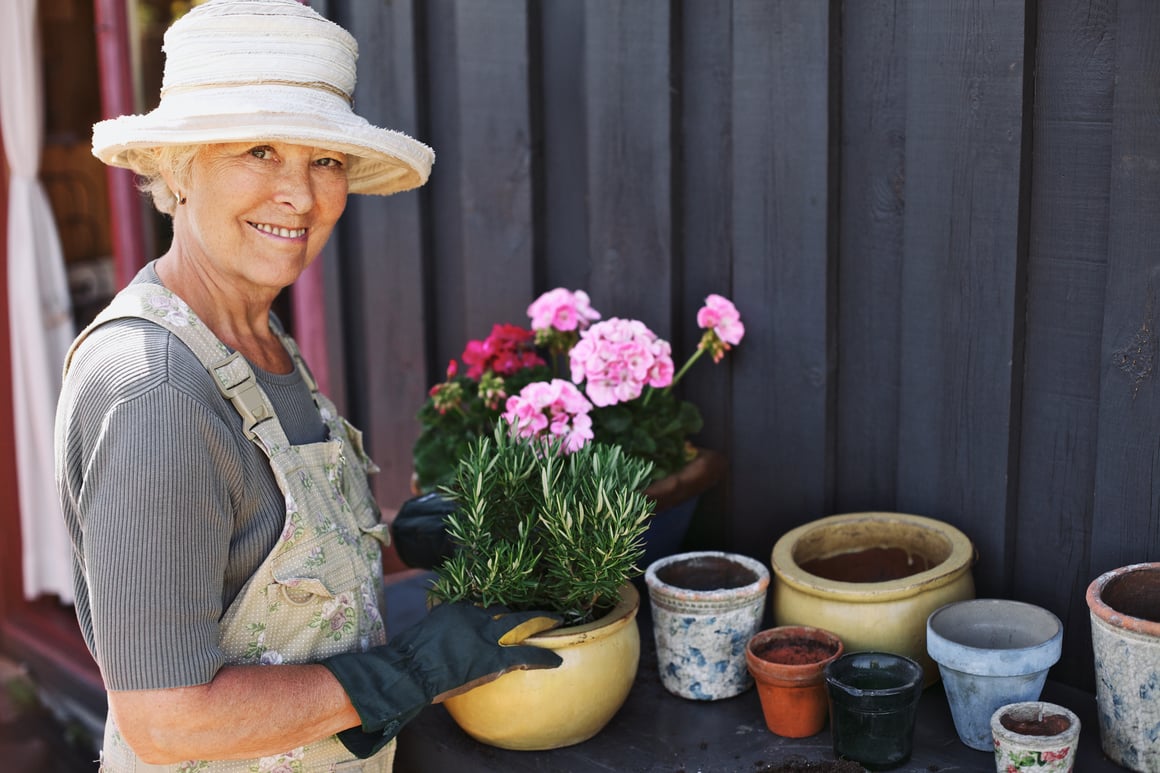 Woman with potted flowers
