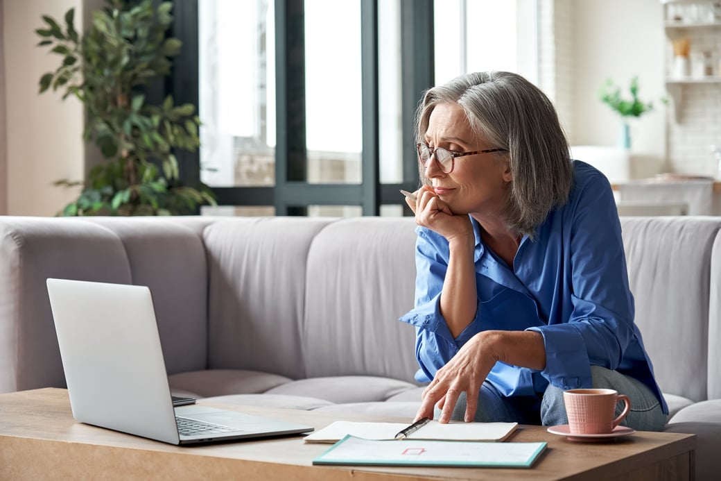 Senior woman taking courses online