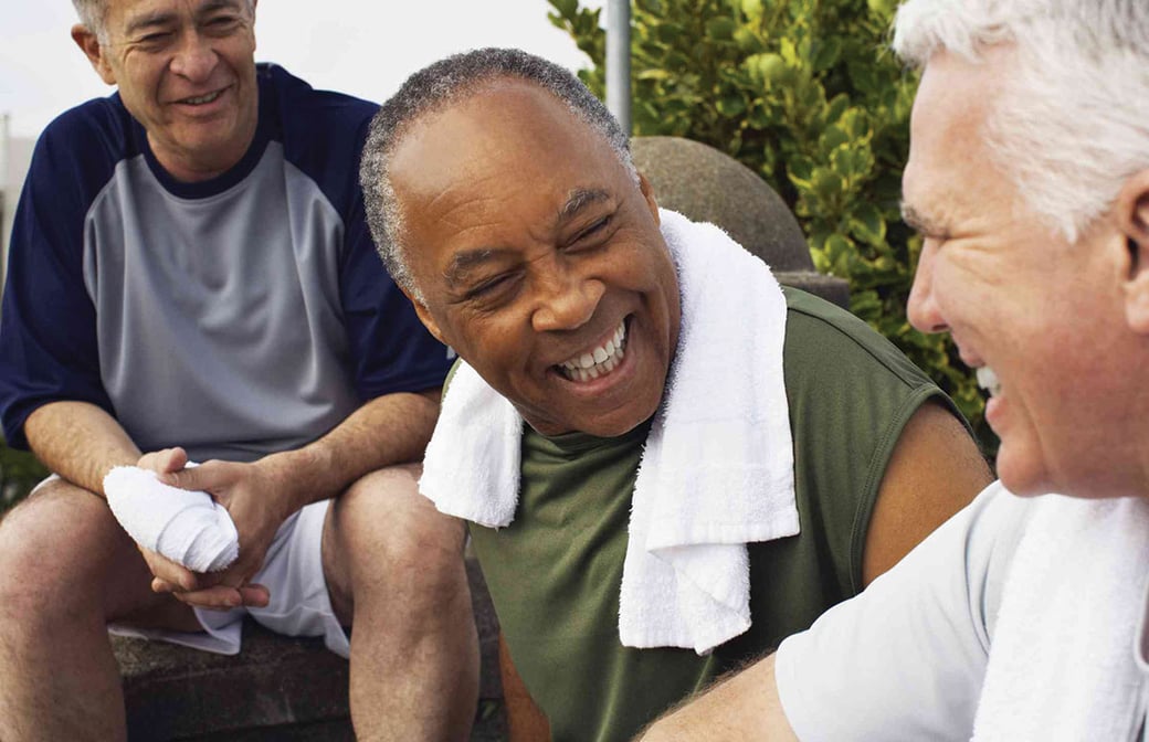 Senior men resting after exercising