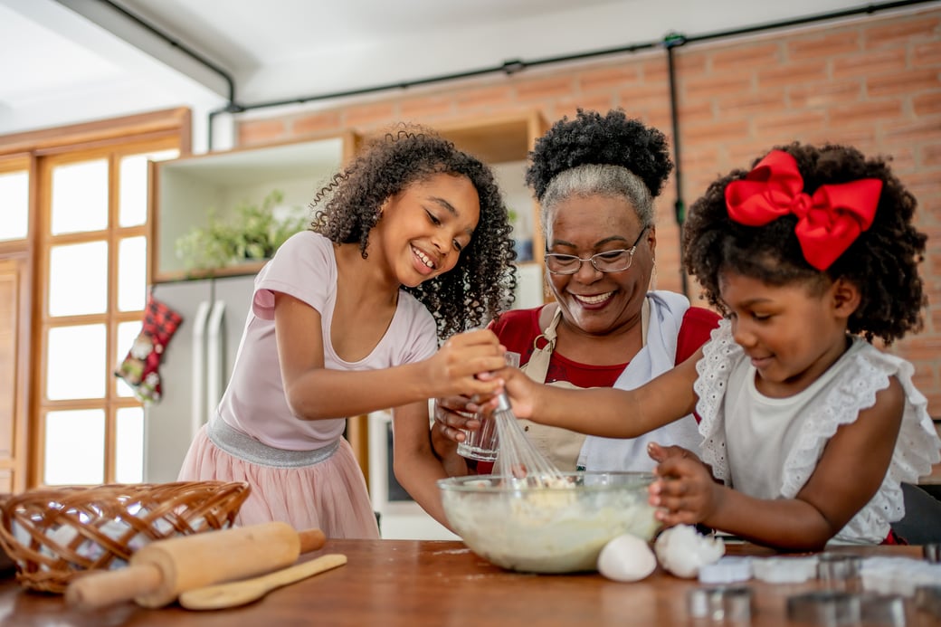 Senior grandmother baking with grandchildren