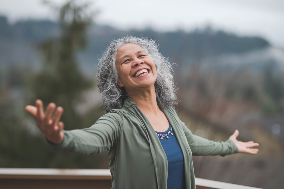 Senior woman overlooking scenery