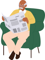 man in chair reading newspaper